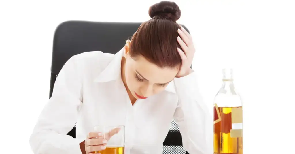 Distressed woman experiencing alcohol addiction stress showing effects on brain function and mental health