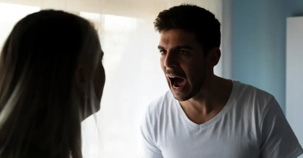 Man shouting during an argument showing emotional volatility caused by alcohol addiction in relationships