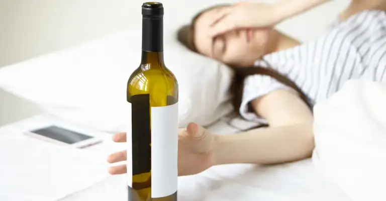 Woman experiencing alcohol withdrawal symptoms during detox timeline